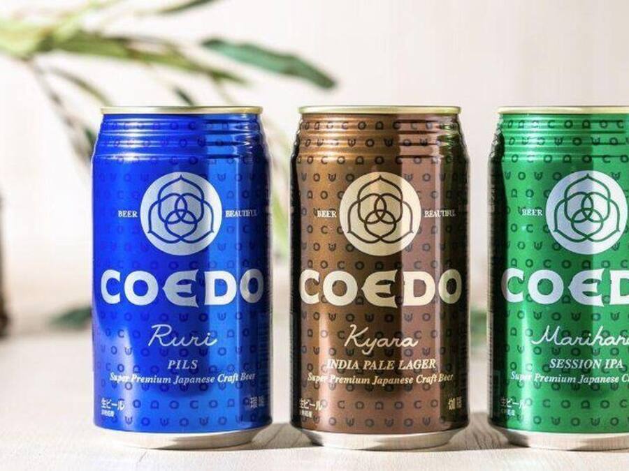 Three cans of Coedo beer in different flavors.