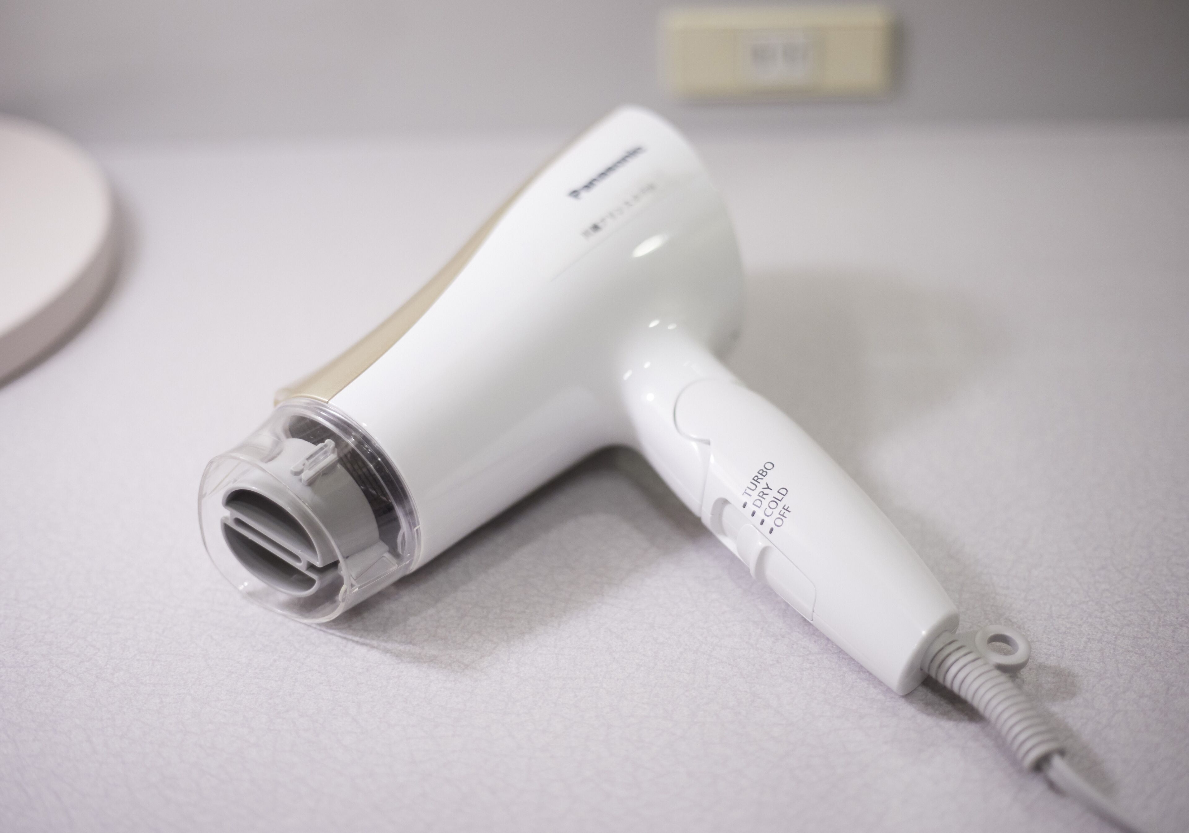 combined shower/bathtub, free toiletries, hair dryer, slippers