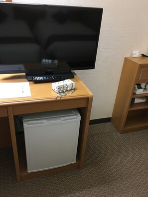 Desk, blackout drapes, bed sheets