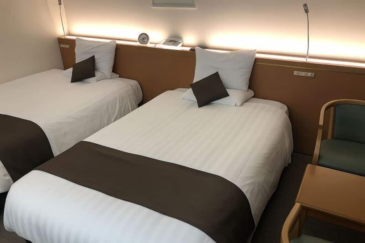 Desk, blackout curtains, bed sheets