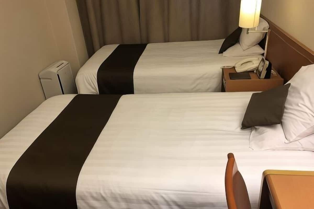 Desk, blackout curtains, bed sheets