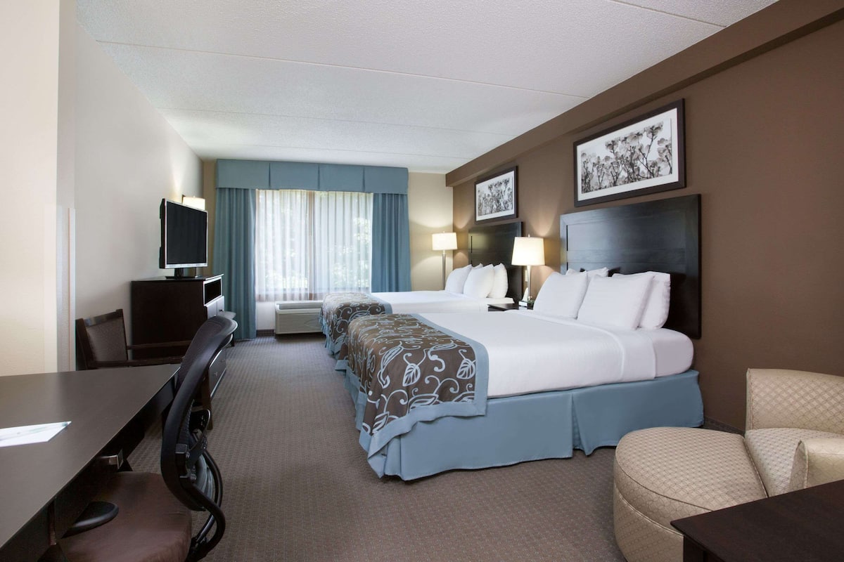 Room, 2 Queen Beds, Non Smoking | In-room safe, desk, iron/ironing board, free cribs/infant beds
