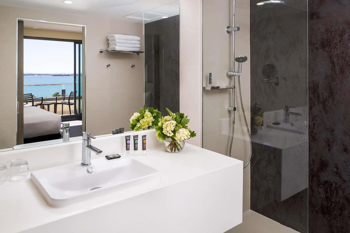 Deluxe Room, 1 King Bed, Bay View | Minibar, in-room safe, desk, laptop workspace