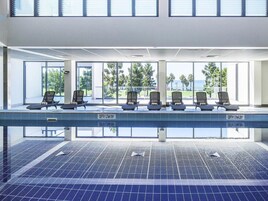 Indoor pool, open 5:00 AM to 10:00 PM, sun loungers