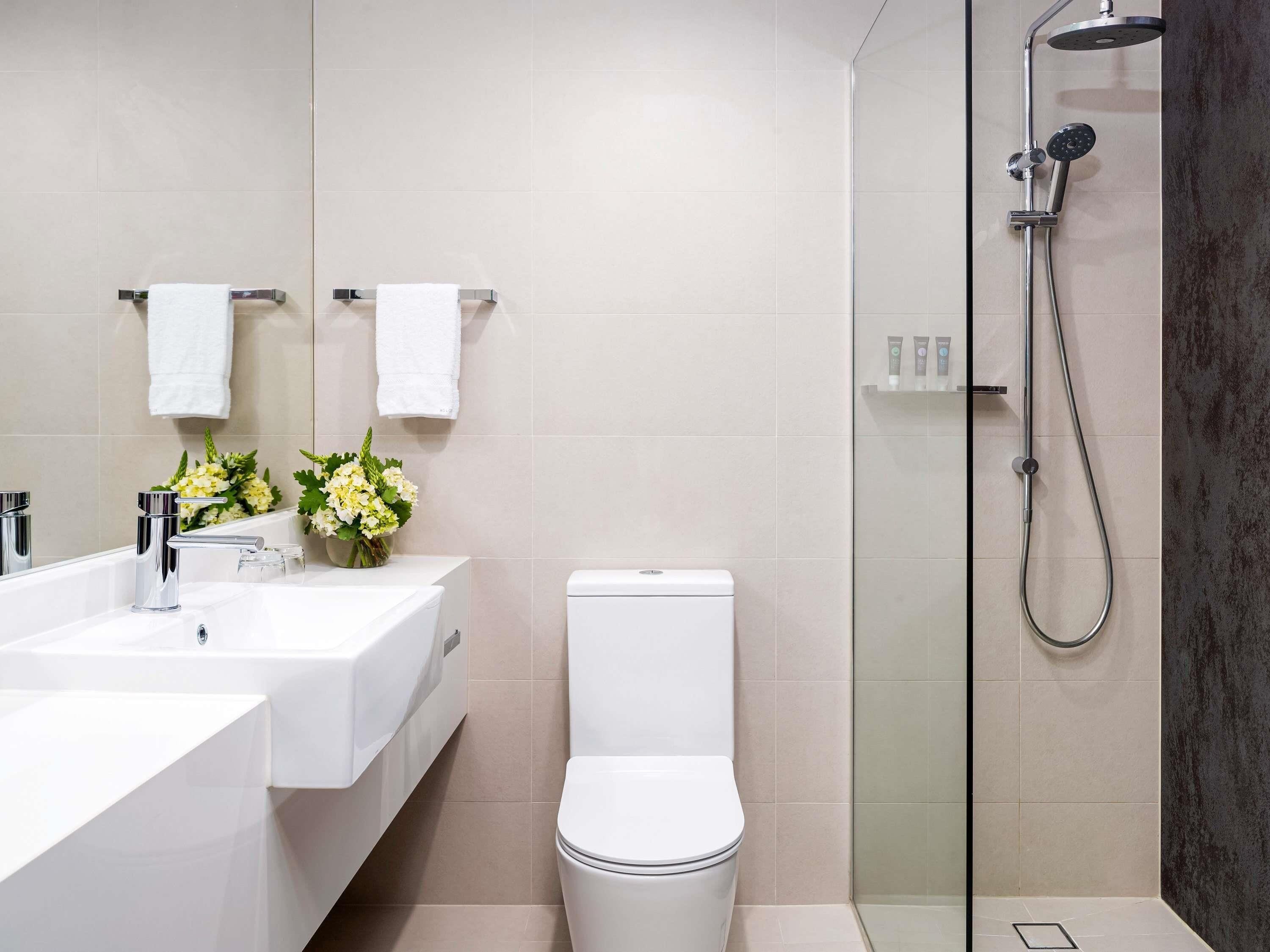 Shower, rainfall showerhead, eco-friendly toiletries, hair dryer