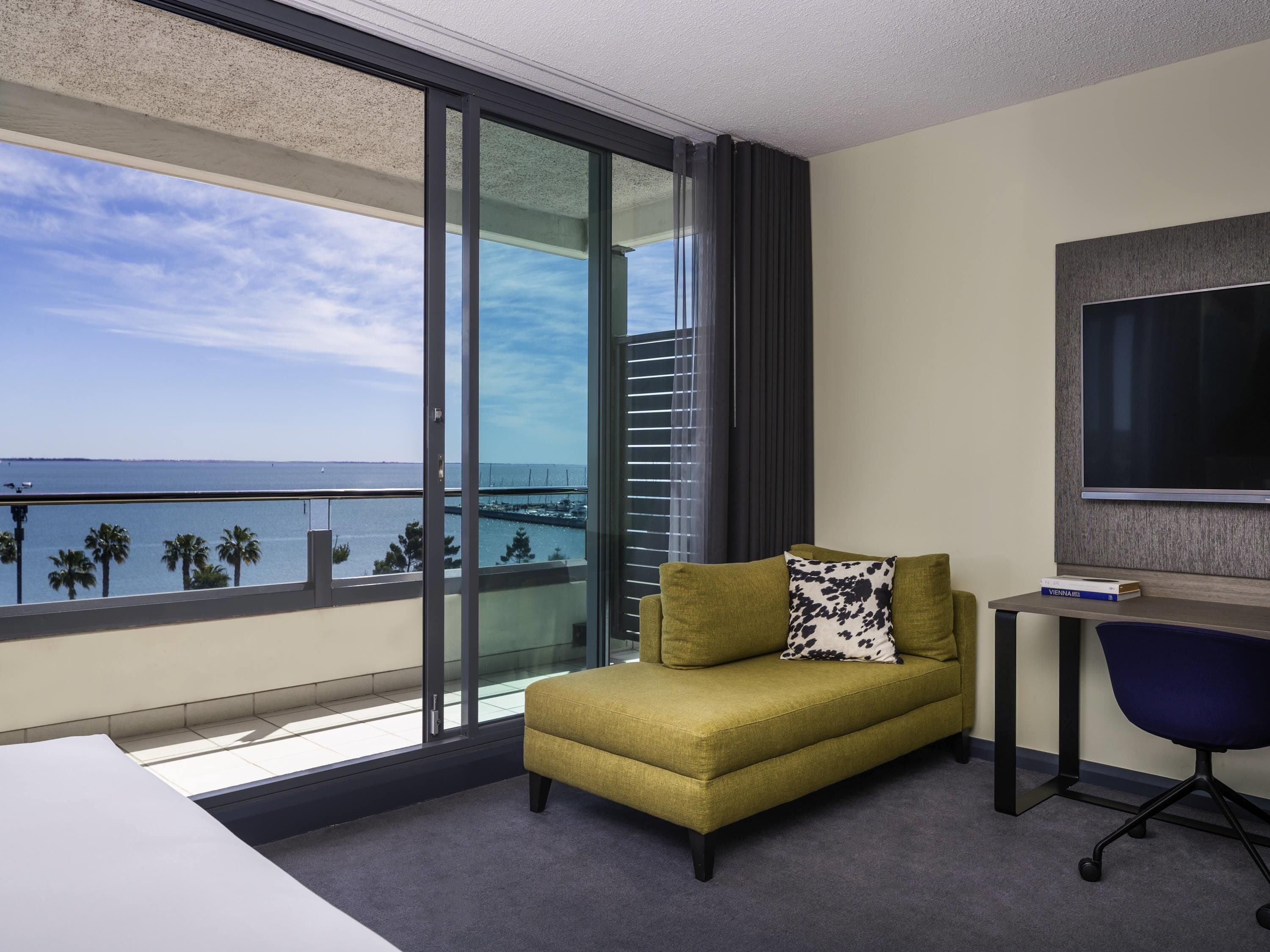 Deluxe Room, 1 King Bed, Bay View | Minibar, in-room safe, desk, laptop workspace