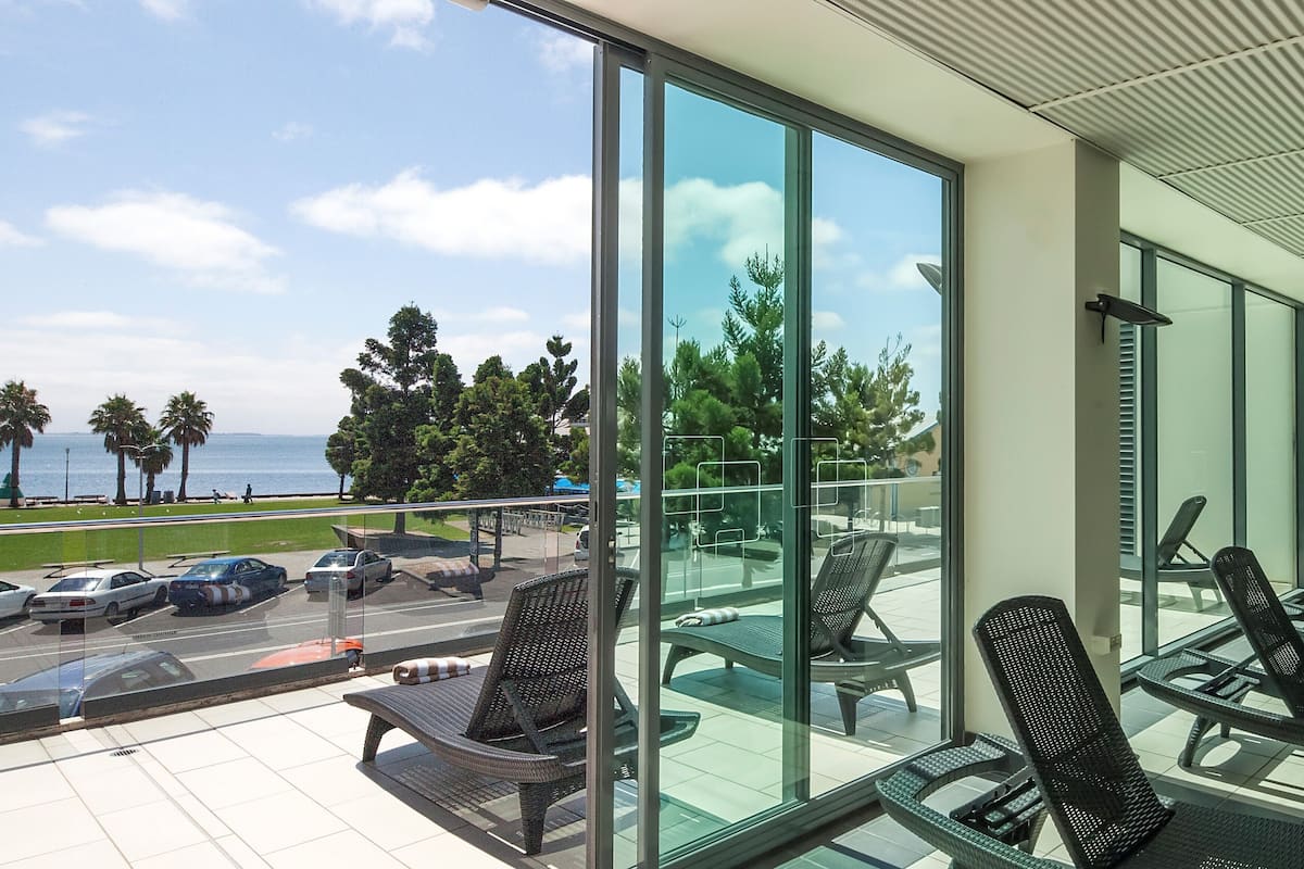 indoor pool, open 5:00 am to 10:00 pm, pool loungers