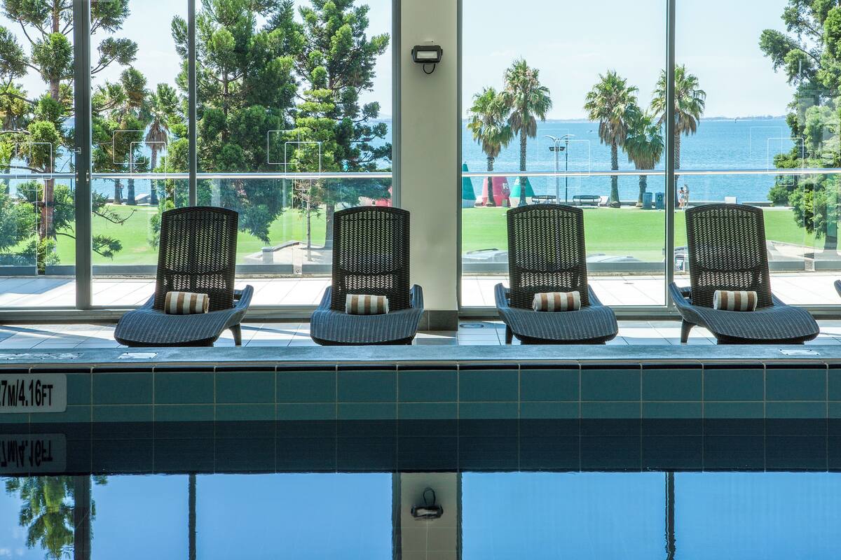 indoor pool, open 5:00 am to 10:00 pm, pool loungers