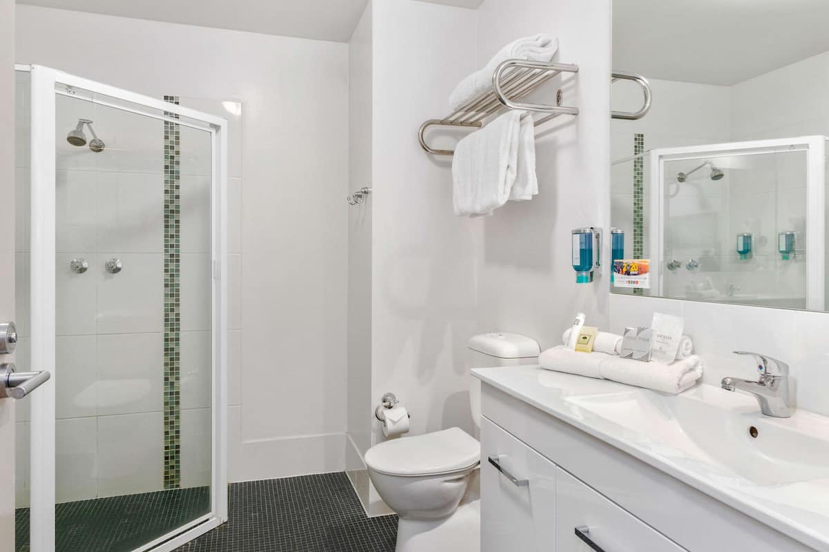 standard room, 2 queen beds | 1 bedroom, desk, iron/ironing board, rollaway beds