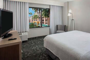 1 bedroom, premium bedding, desk, blackout drapes at Courtyard Orlando Lake Buena Vista in the Marriott Village