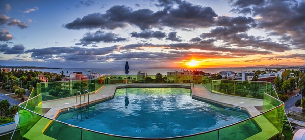 Outdoor pool, pool umbrellas, pool loungers