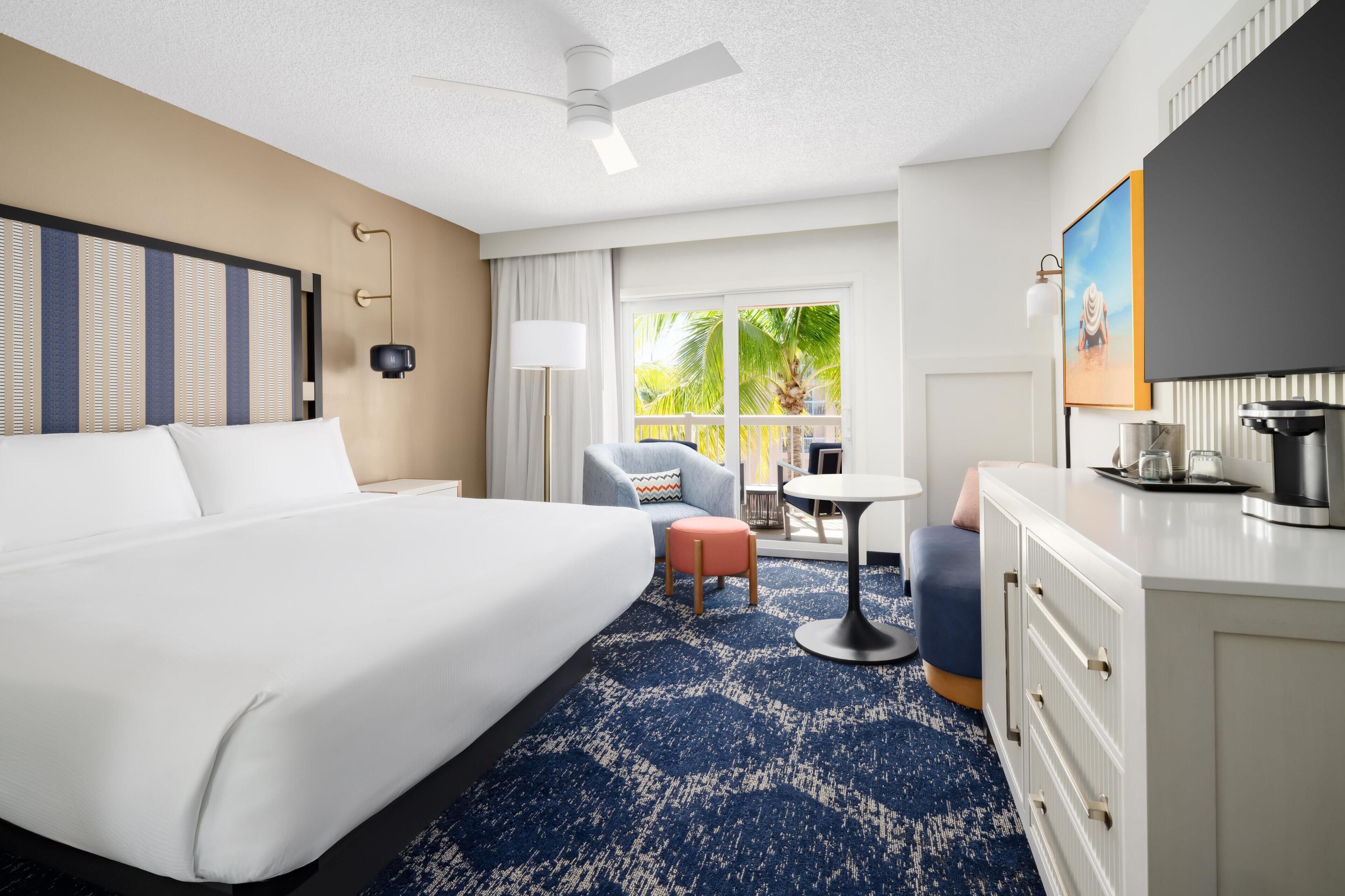 Room, Balcony, Pool View | Premium bedding, down comforters, in-room safe, desk