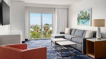 Room, 1 King Bed | Living area | 40-inch LED TV with cable channels, TV, pay films