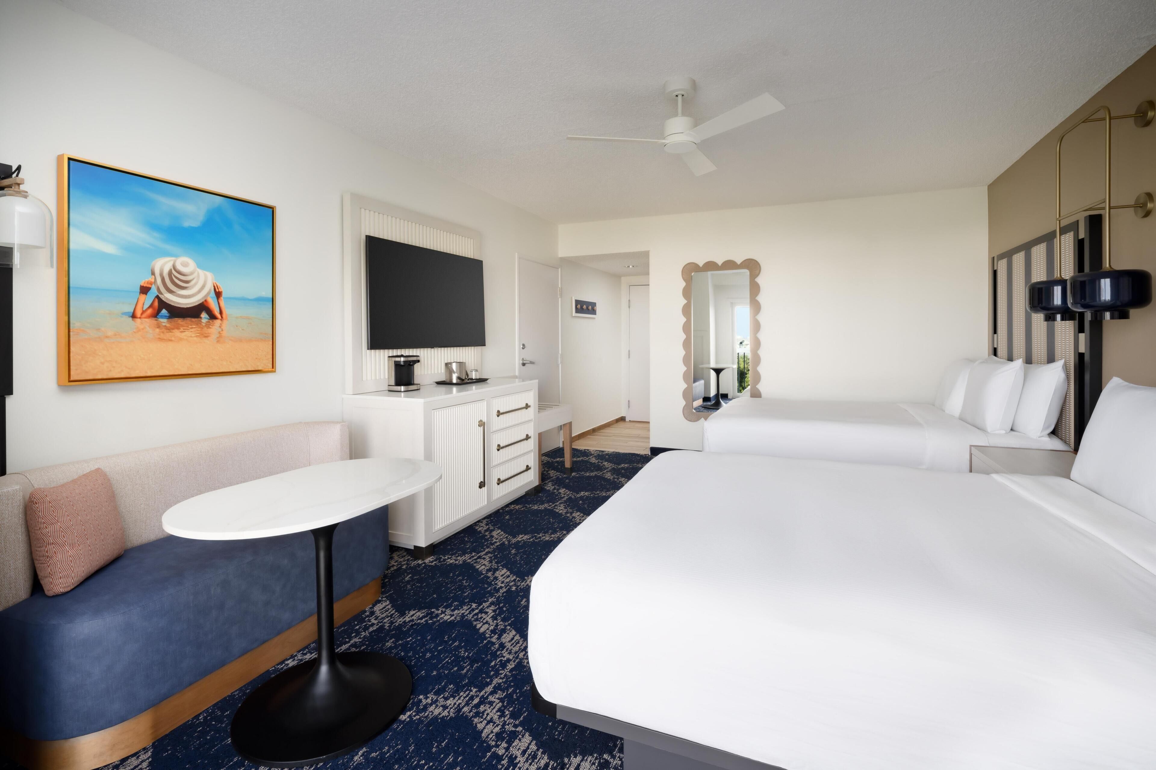 Premium bedding, down comforters, in-room safe, desk