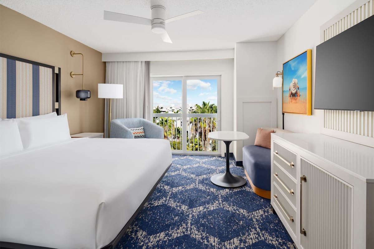 Premium bedding, down comforters, in-room safe, desk