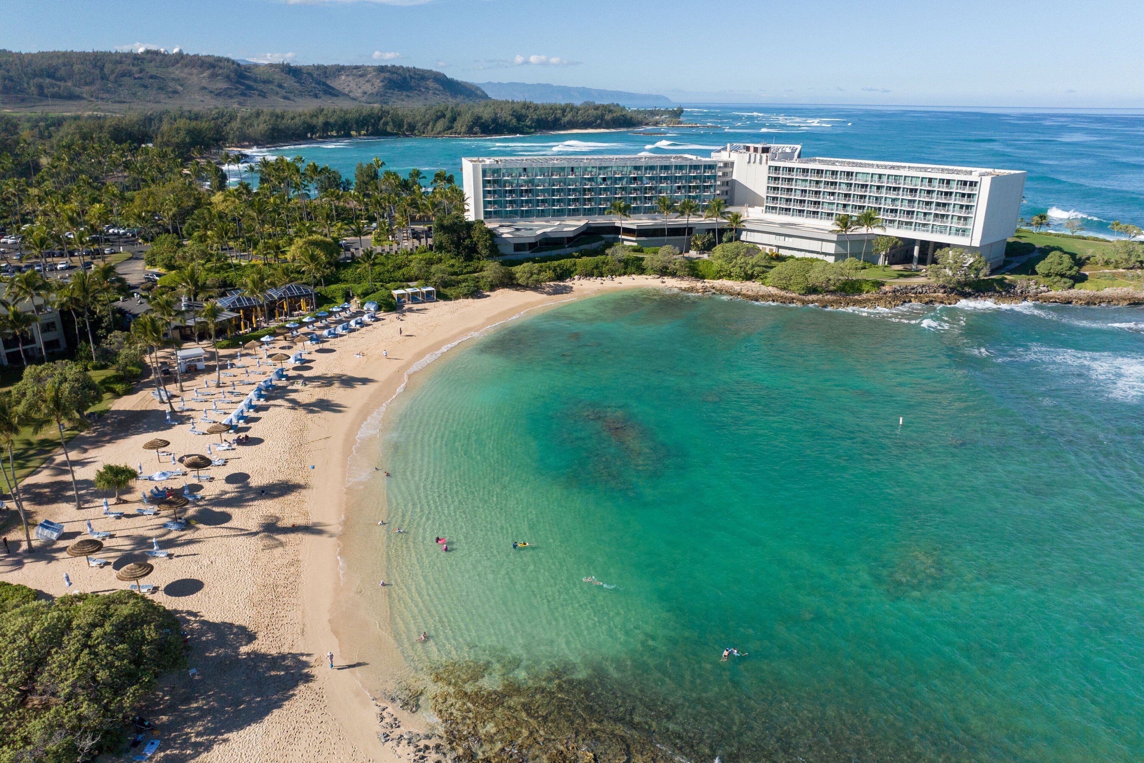On the beach, beach umbrellas, beach towels, snorkelling