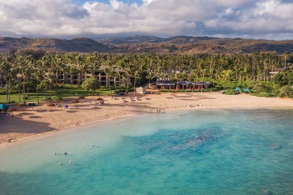 On the beach, beach umbrellas, beach towels, snorkelling