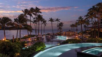 5 outdoor pools, cabanas (surcharge), pool umbrellas