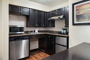 Suite, 1 King Bed, Accessible, Bathtub | Private kitchen | Full-size fridge, microwave, stovetop, coffee/tea maker