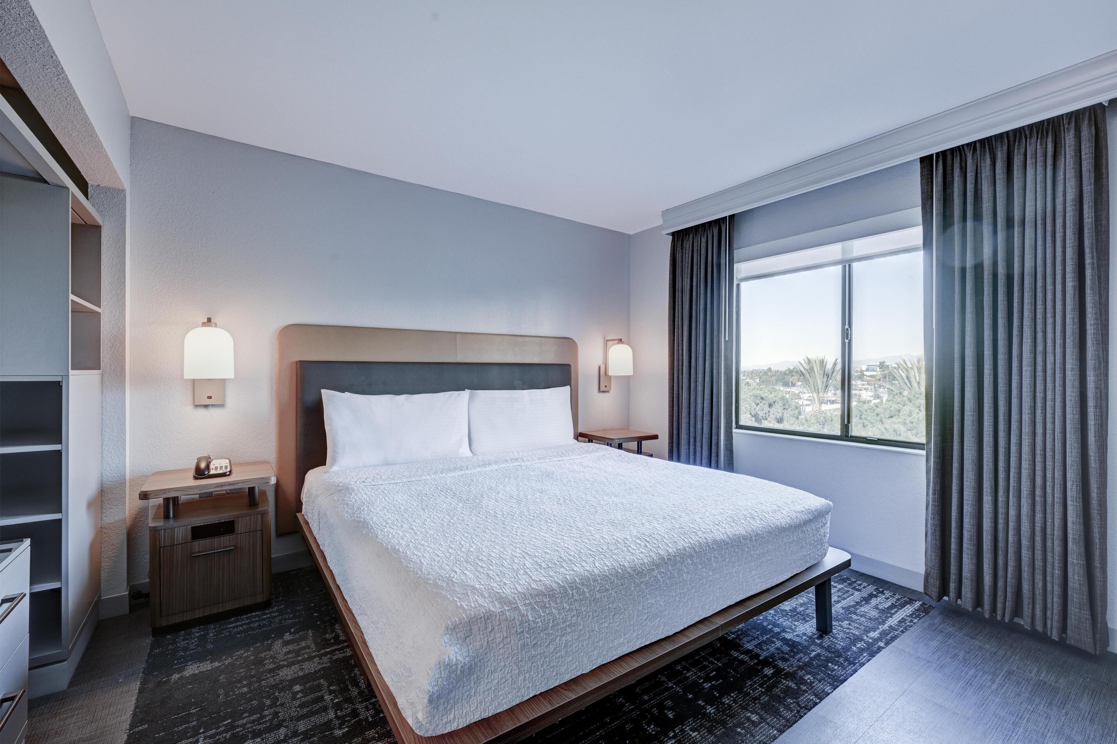 Individually furnished, desk, laptop workspace, iron/ironing board