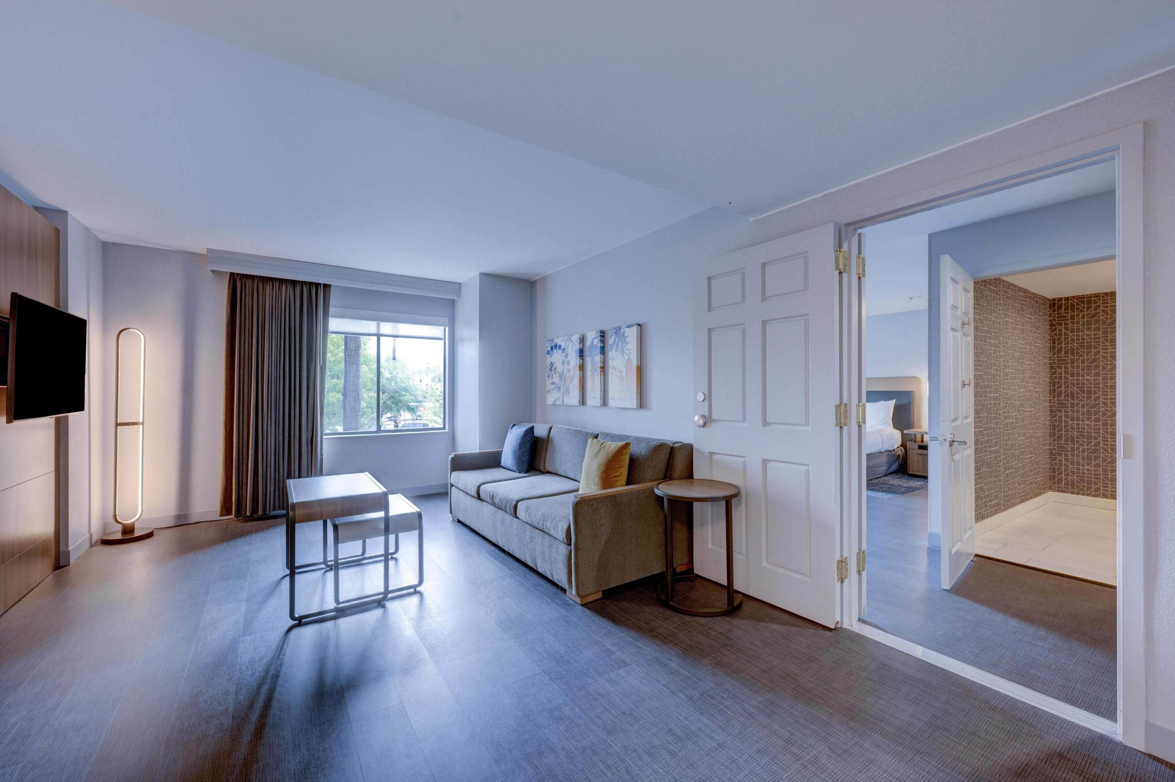 Suite, 2 Queen Beds, Accessible, Non Smoking (Roll-in Shower) | Living area | 32-inch flat-screen TV with cable channels, TV, pay films