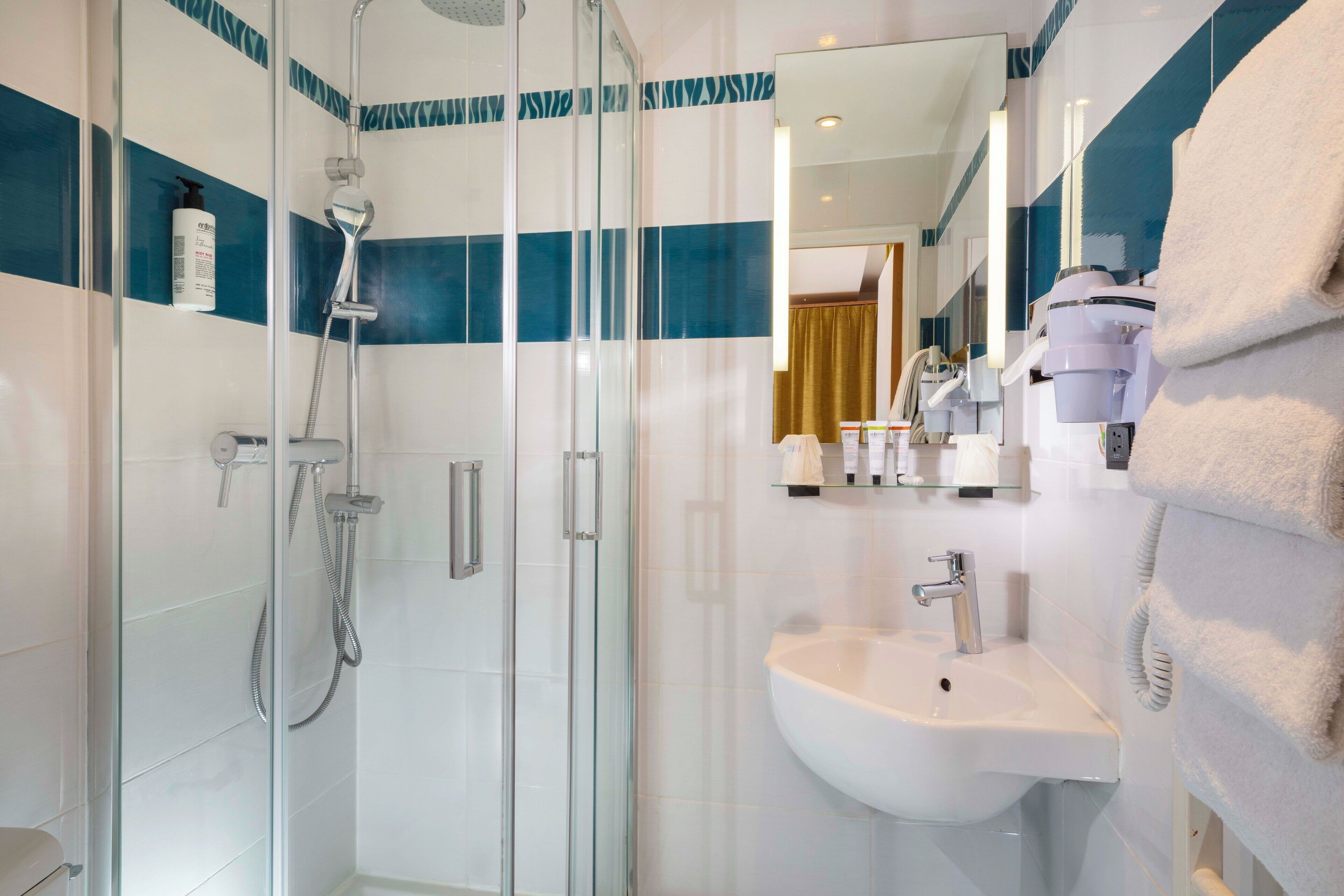 superior double room | bathroom | shower, free toiletries, hair dryer, slippers