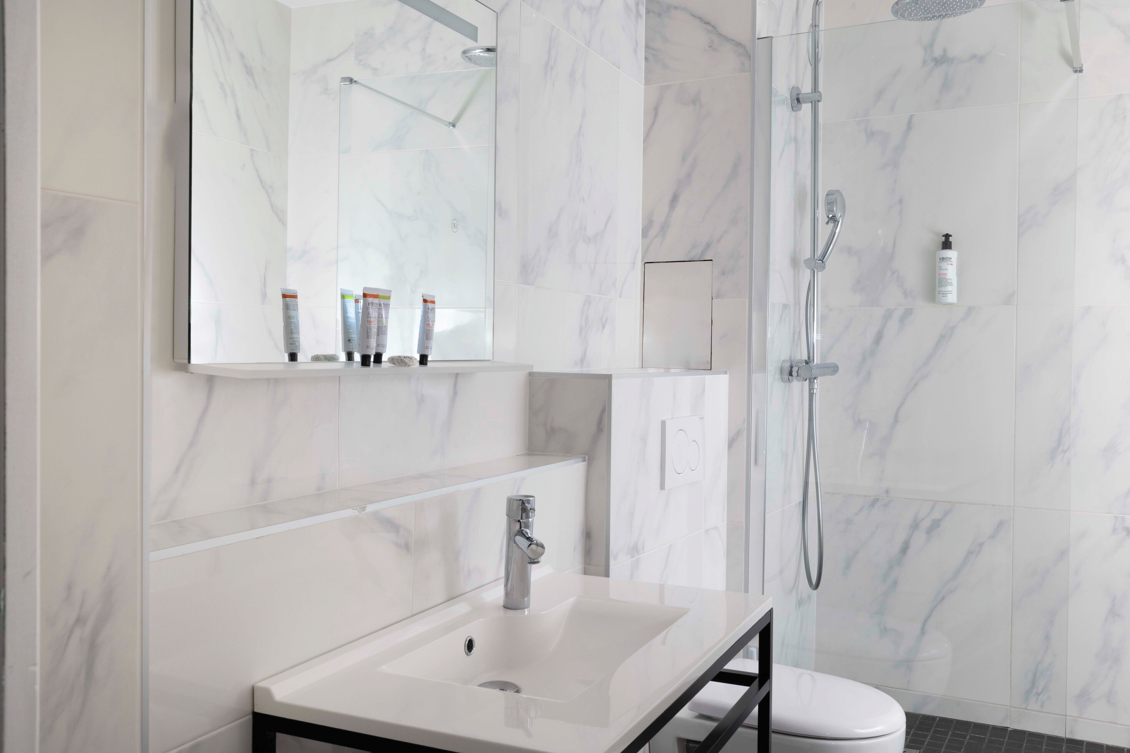 superior twin room | bathroom | shower, free toiletries, hair dryer, slippers