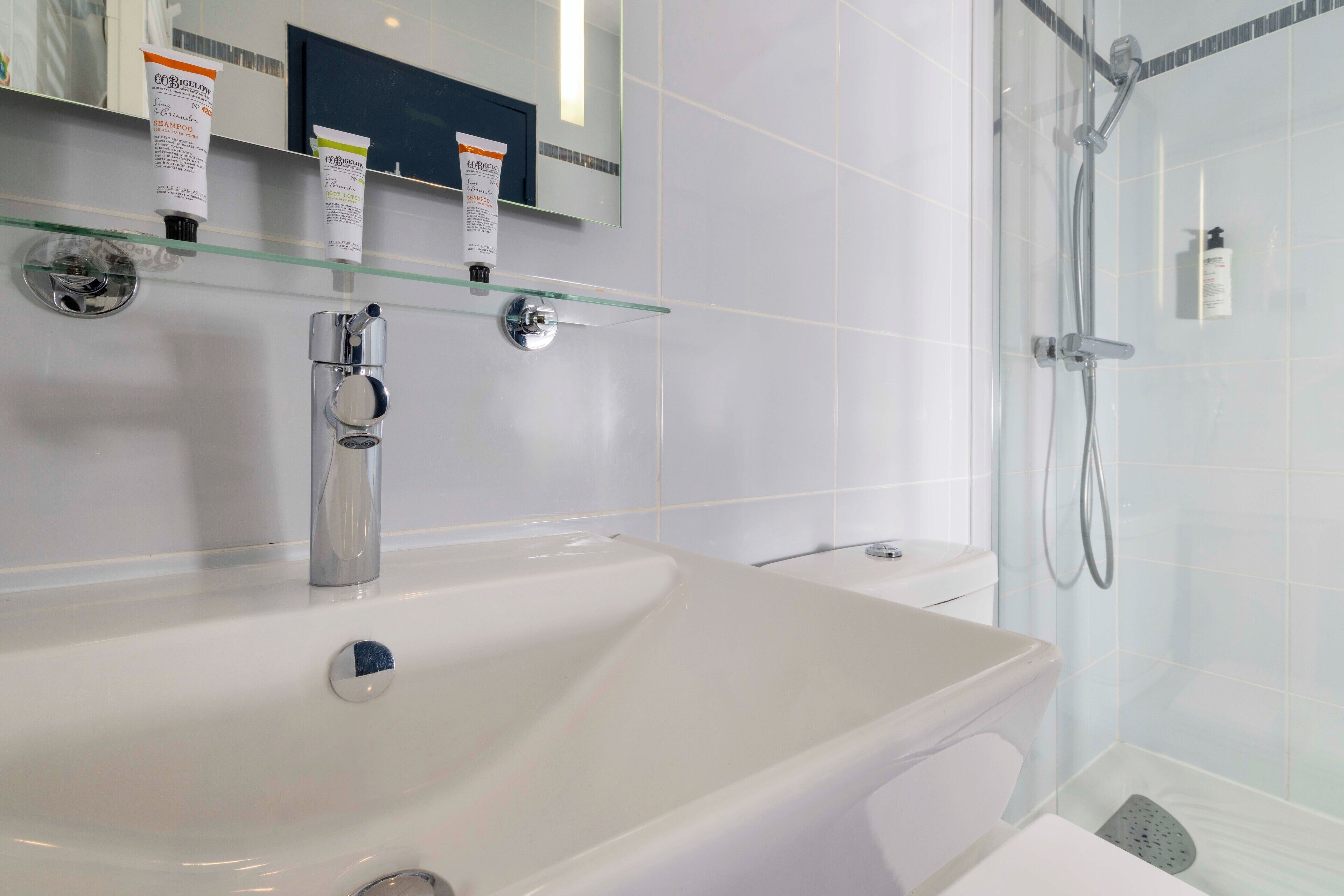 superior twin room | bathroom | shower, free toiletries, hair dryer, slippers