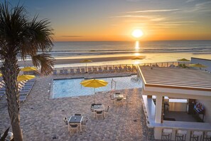 Outdoor pool, open 7:00 AM to 10:00 PM, cabanas (surcharge)
