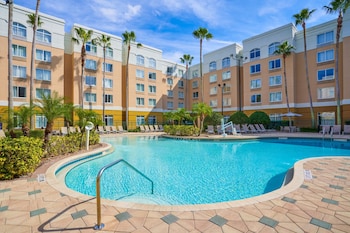 Indoor pool, 3 outdoor pools, open 8:00 AM to 10:00 PM, pool umbrellas at SpringHill Suites Orlando Lake Buena Vista Marriott Village