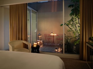 Deluxe Garden Room | Premium bedding, minibar, in-room safe, desk