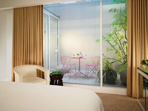 Deluxe Garden Room | Premium bedding, minibar, in-room safe, desk