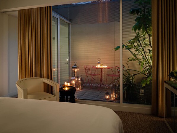 Deluxe Garden Room | Premium bedding, minibar, in-room safe, desk