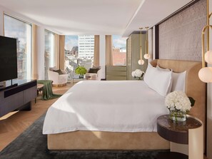 A modern hotel room with a large bed, a TV, and a city view. - St Martins Lane London, a Morgans Originals hotel (London)