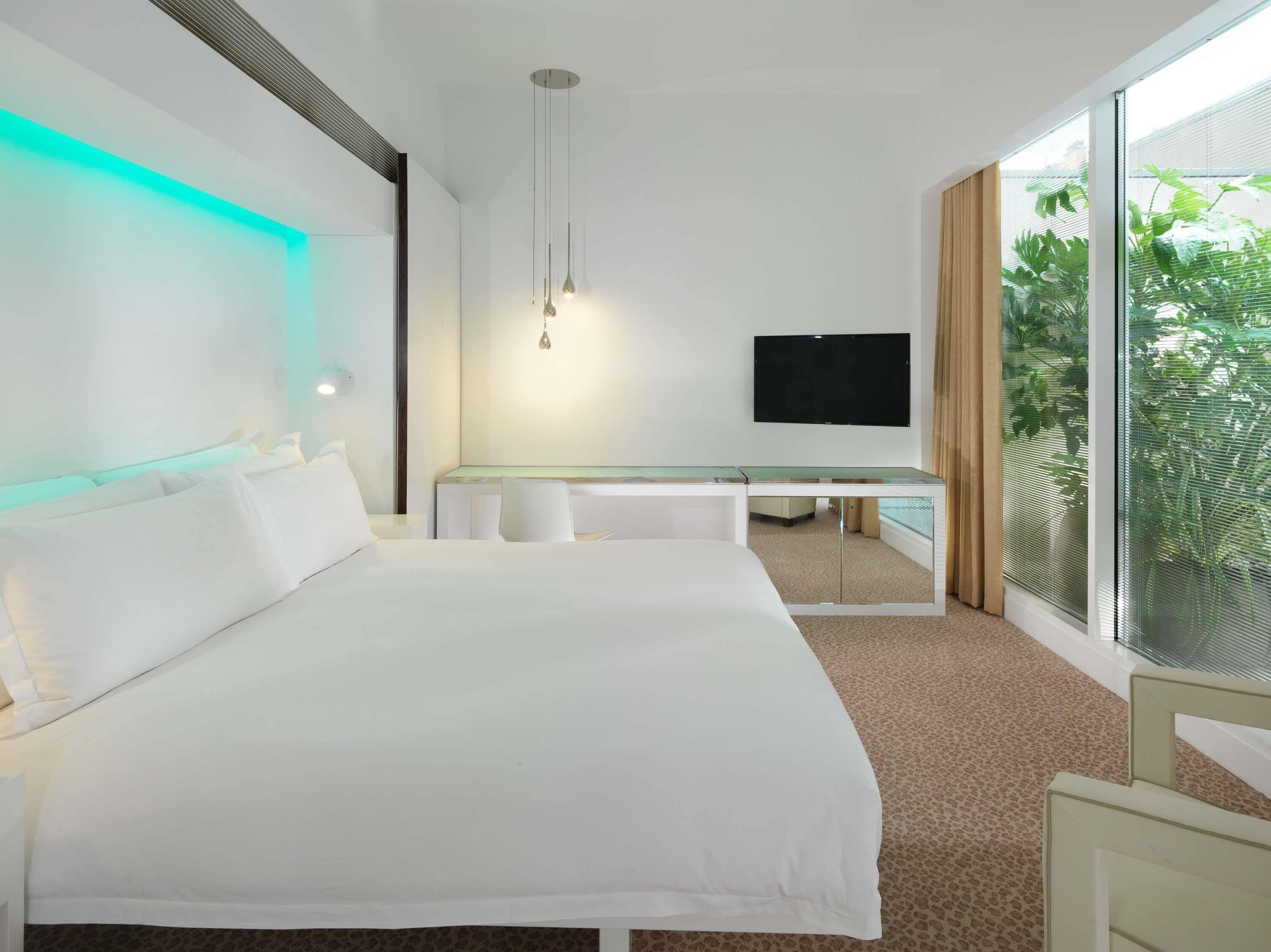 Deluxe Garden Room | Premium bedding, minibar, in-room safe, desk