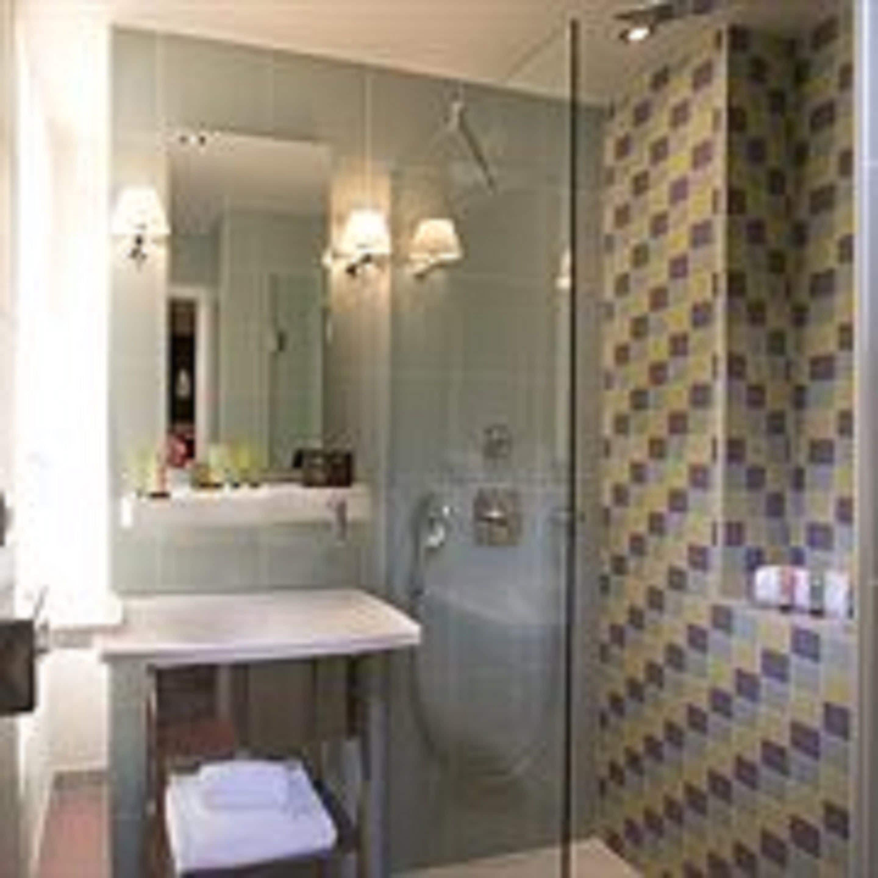 triple room | bathroom | shower, rainfall showerhead, designer toiletries, hair dryer