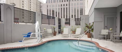 Outdoor pool, open 9:00 AM to 10:00 PM, sun loungers