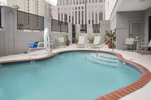 Outdoor pool, open 9:00 AM to 10:00 PM, pool loungers