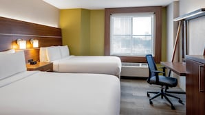 A hotel room with two beds, a desk, a chair, and a large window. - Holiday Inn Express New Orleans Downtown by IHG (New Orleans)