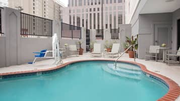 Outdoor pool, open 9:00 AM to 10:00 PM, sun loungers