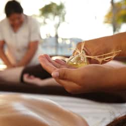 Experience soothing massage therapy in a serene outdoor setting.