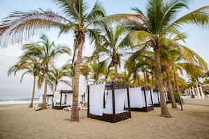 On the beach, beach towels, snorkelling, beach volleyball