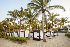 On the beach, beach towels, snorkeling, beach volleyball