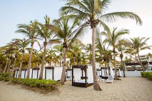 On the beach, beach towels, snorkelling, beach volleyball