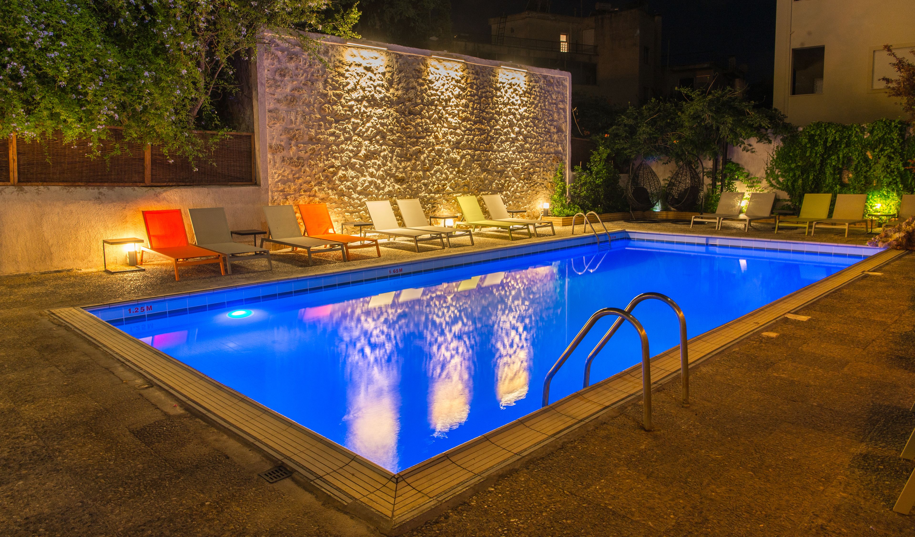 outdoor pool, pool umbrellas, pool loungers