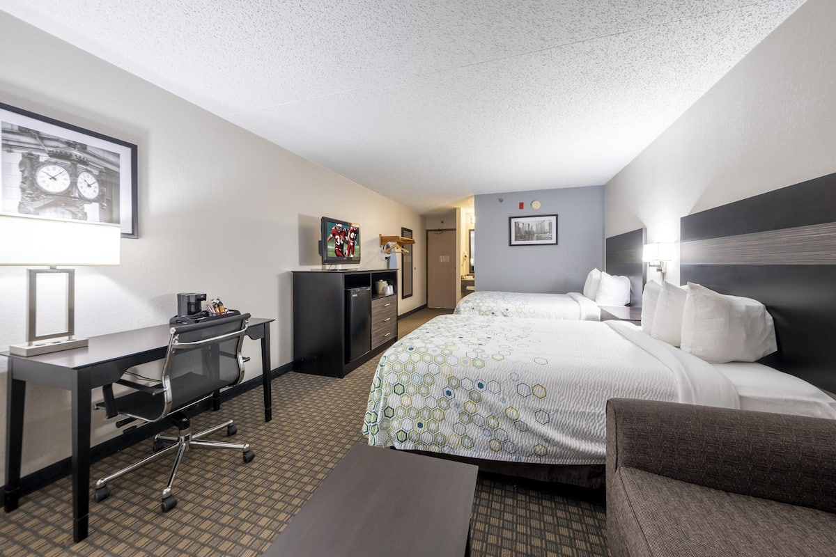 desk, laptop workspace, blackout curtains, iron/ironing board