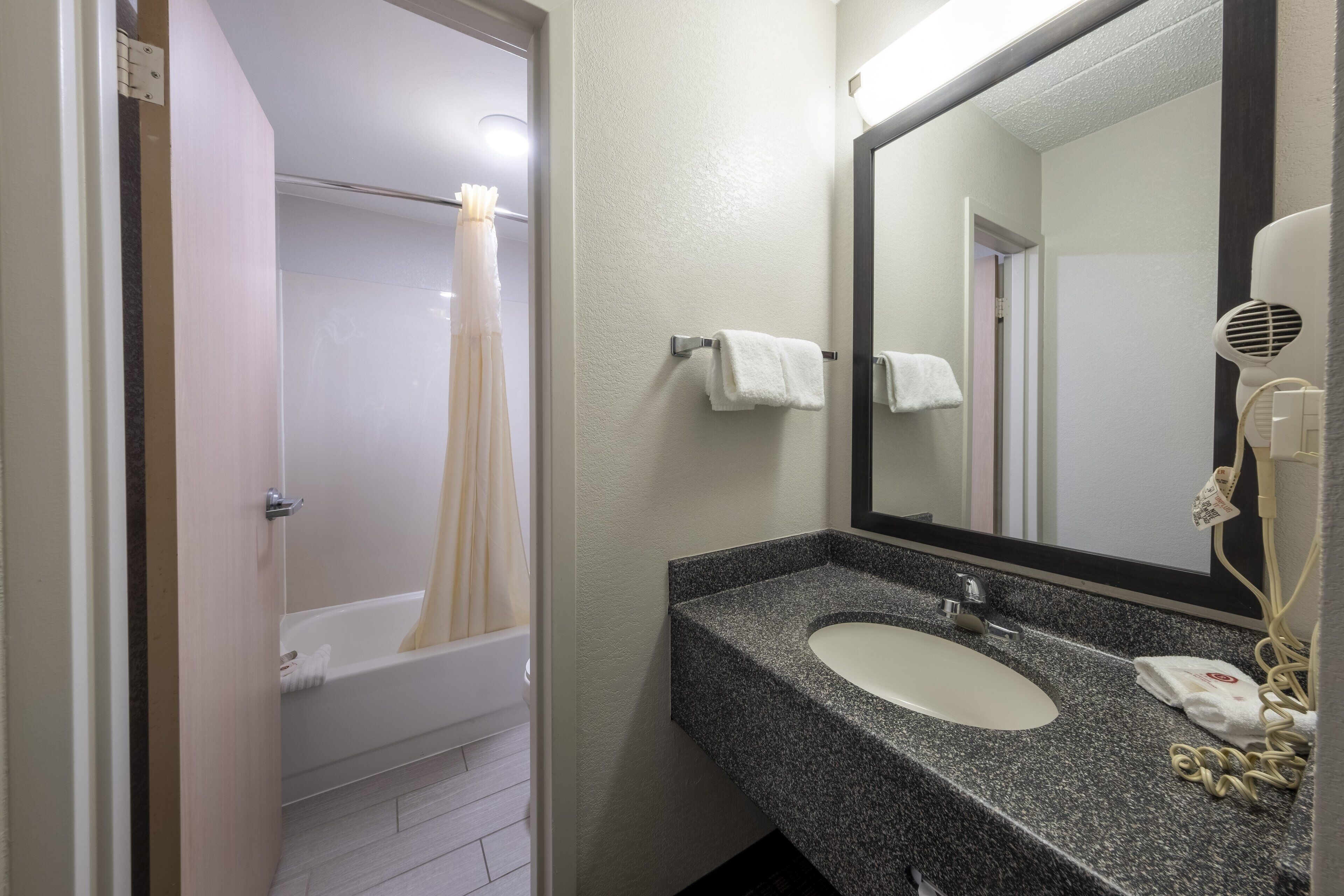 combined shower/bathtub, free toiletries, hair dryer, towels