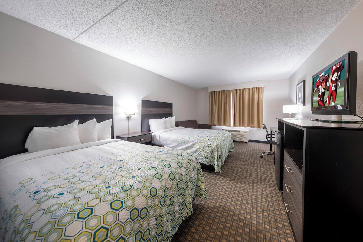 desk, laptop workspace, blackout curtains, iron/ironing board