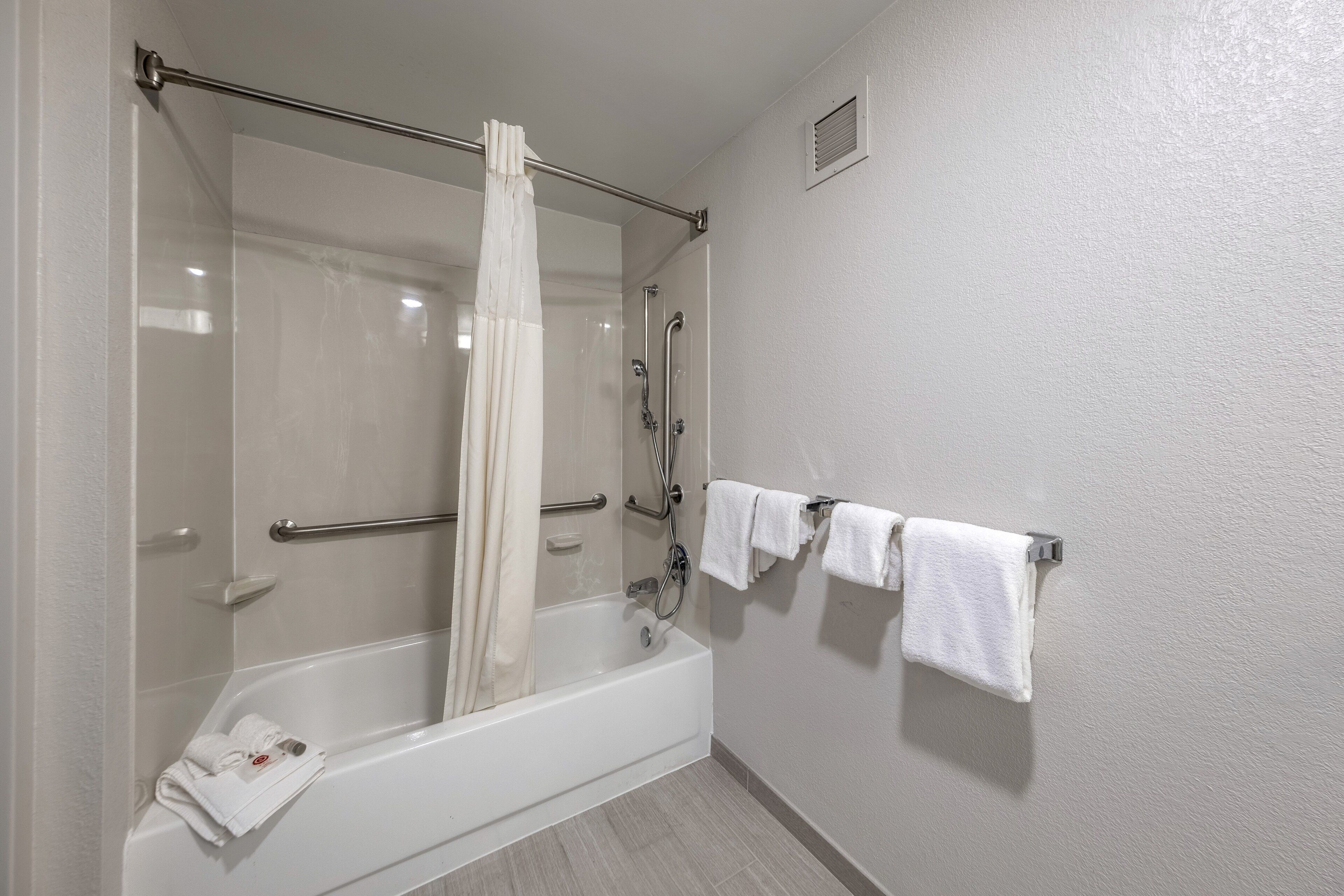 combined shower/bathtub, free toiletries, hair dryer, towels