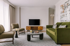 Suite supérieure, 1 grand lit et 1 canapé-lit | Fer et planche à repasser, accÚs au Wi-Fi (inclus), literie fournie